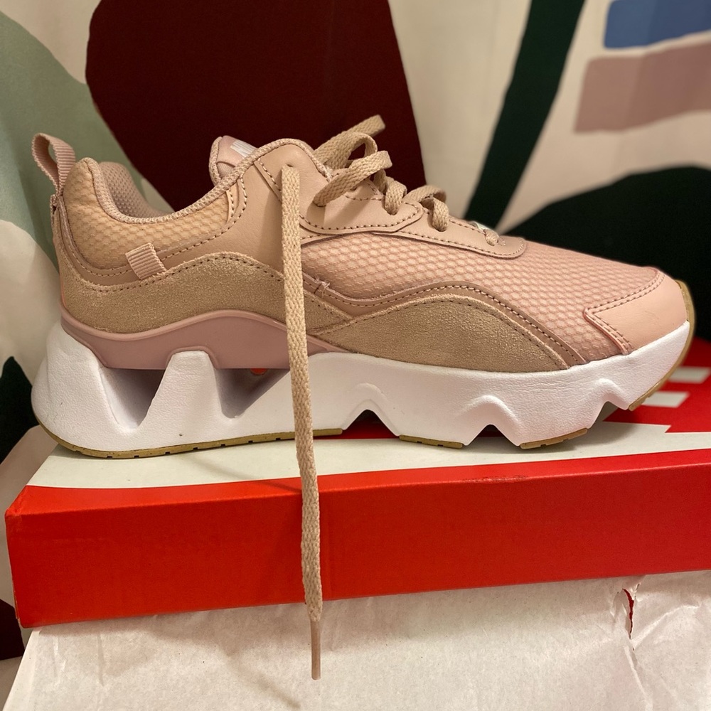 Brand new pink and white Nike sneakers